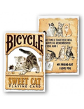 Playing card with cat design and text on a white background